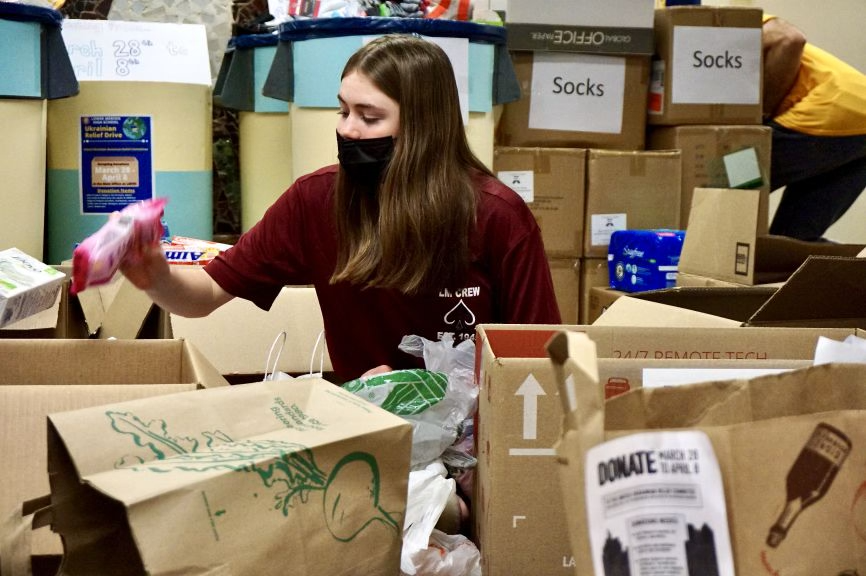 Over the course of three school days, student volunteers work to pack
collected items into a truck to send to Ukrainian refugees. | Photo courtesy of