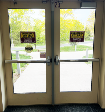 While students still enter through these  side doors in the morning, new regulation prevents students from exiting through these same doors. | Photo by 