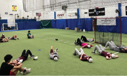 The baseball team meditating 
before practice. | Photos courtesy of Colin Quinn
